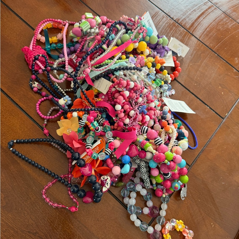Roughly 100 pieces of Gymboree accessories